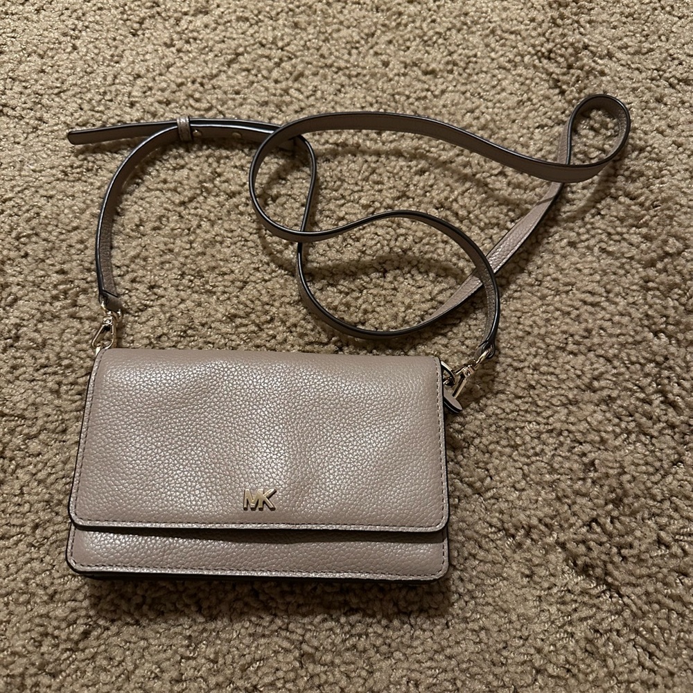 Michael Kors cross body wallet purse in beige. Like new condition.